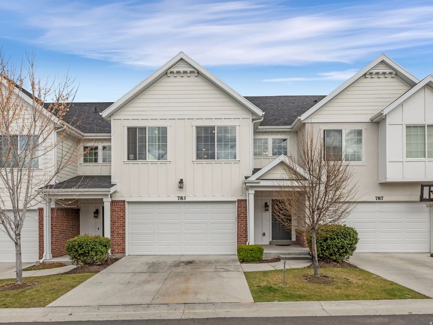 Cottages at Sandy HOA  4 bedrooms  Daylight basement  Covered patio  2-car attached garage  Shopping within 0.5 mi  Built in 2018, this row-mid townhouse in Cottages at Sandy HOA offers 2,290 sq ft with 4 bedrooms, 2 full baths, 1 three-quarter bath, and 1 half bath. At 783 E Newfield Dr in Sandy, the layout includes a great room, granite countertops, built-in dishwasher, gas range, walk-in closet, separate tub and shower in the primary bath, and a fully finished daylight basement. The covered patio opens toward the community common area, and the attached 2-car garage adds everyday convenience. HOA amenities and coverage include maintenance, insurance, picnic area, playground, snow removal, trash, and water.
