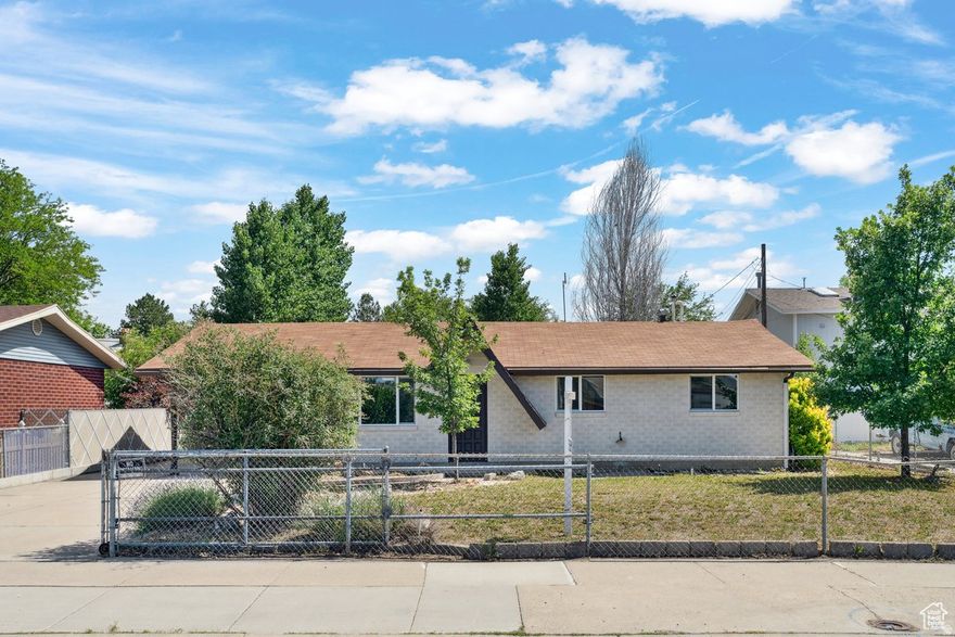 Beautifully remodeled east side Sandy home, updated with modern touch. New flooring, new windows, new bathrooms and more...plenty of parking with oversized 2 car garage and workshop, large backyard for entertainment, sitting on large lot with a view of beautiful mountains. This house has it all. Main level features 3 bedrooms and 1 1/2 baths, living room, semiformal dinning and kitchen with granite counter tops. Basement has 2 additional bedrooms and a big bathroom and laundry and large theater room for entertainment with big screen T.V. Clean ready to move in!