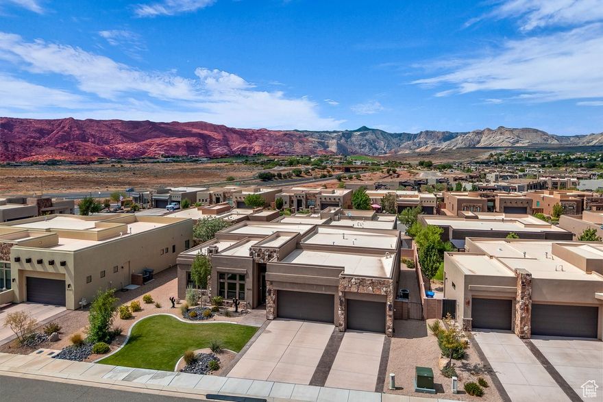 This stunning 3-bedroom home offers nearly 2,500 SqFt of living space, and is perfectly positioned to capture the incredible red rock views that surround the neighborhood. Step inside to soaring 10+ ft. ceilings, an open floor plan, and large windows that flood the home with natural light. The kitchen showcases beautiful granite countertops, while sleek electric blinds throughout add both elegance and convenience. Retreat to the spacious primary suite, where you'll find a spa-like bath with a dual-vanity, a walk-in shower, a large soaking tub, and an oversized walk-in closet. Thoughtful details include a custom-built Murphy bed for guests, a spacious laundry room with abundant storage, and inviting living spaces that flow seamlessly to the outdoors. The private backyard is an entertainer's dream with a covered patio and putting green, while the extra-deep 3-car garage offers exceptional parking and storage for all your needs. Buyer to verify all information, deemed reliable, however buyer to verify all info including utilities, rental restrictions, and HOA information if applicable.