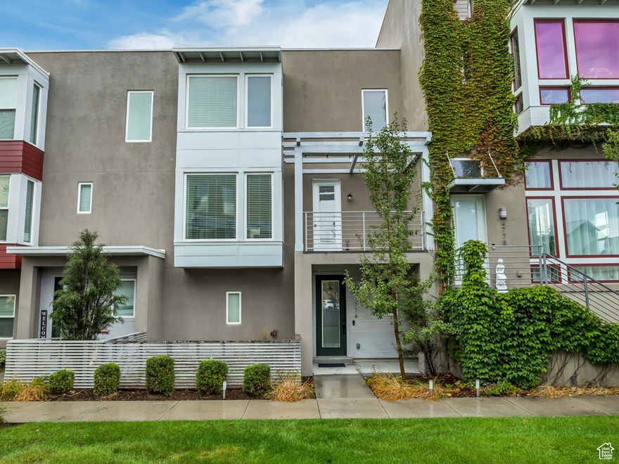You must see this beautiful Townhome in the coveted Soda Row area of Daybreak! Sellers just had Townhome Professionally Painted and New LVP Flooring installed. This is a Fantastic (3) Bedroom, (2 1/2) Bathroom Townhome with (2) Balconies. Main-floor has a large Family Room, Kitchen, Half Bath, Semi Formal Dining area. Family Room has built in cabinetry, tall ceilings, one of the homes spacious balconies, and lots of windows. Kitchen has island with breakfast bar, lots of cabinetry with food prep space, granite countertops, stainless steel appliances, and window over sink. Semi formal dining area can accommodate a larger table and has homes 2nd balcony. Bedrooms and closets have great space to them. Primary Bedroom is large with its Bathroom having double sinks, granite countertops, tub/Shower, and walk in closet. Laundry area is conveniently located near and between Bedrooms. There is a quaint lawn space next to front door with half high fence and gate. 2 car Garage is considered oversized having extra width on one side, and extra depth on the other side to accommodate larger vehicles. You have heard the saying Location, Location, Location... This Townhome is walking distance from many of the benefits of Daybreak. Here are a few amenities Daybreak has to offer: food, shopping, entertainment, outdoor and on the water activities, parks, dog parks, fishing, pools, playgrounds, miles of pathways, fitness center, tennis courts, sand volleyball, basketball courts, zip line park, outdoor summer concerts, food truck round ups, and more. Trax station nearby, however if you commute by car, no problem... you are minutes from Bangerter Hwy and Mountain View Corridor! Information and Square footage figures are provided as a courtesy estimate only and were obtained from past MLS listing. Buyer is advised to obtain an independent measurement.