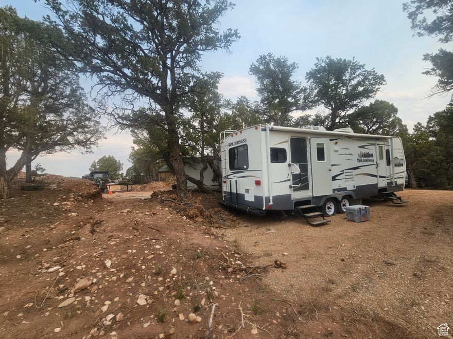 * AMAZING VIEWS from this 5 Acre lot at Bandanna Ranch in Fruitland! * Property has ALL utilities connected with City Water, Power & Septic System in place * Come hookup your RV/camper and enjoy the peace, quiet & serenity in the mountains!! * Year Round Access with nice roads plowed by HOA in the winter * Super solid concrete block retaining wall & flat spot added by the owner for the spectacular views!! Build your dream cabin or more! * Very nice excavated lot with tons of flat spots to bring the friends & family to fit extra camping trailers or tents! * Shed & extras included * This is a perfect location for the outdoor enthusiast, just minutes down the dirt road is Red Creek Reservoir! Strawberry Reservoir, Starvation & Current Creek very close by if you like fishing, boating, kayaking, hiking, mountain biking & more! * Miles & miles of dirt roads for riding side by sides or 4wheelers etc! * Thousands of acres of public land nearby with Tabby Mountain, Ashley National Forest & much more! * Take a breath of fresh mountain air and soak in the stars at night! * This property is a wonderful place to spend all year, retire or just vacation!