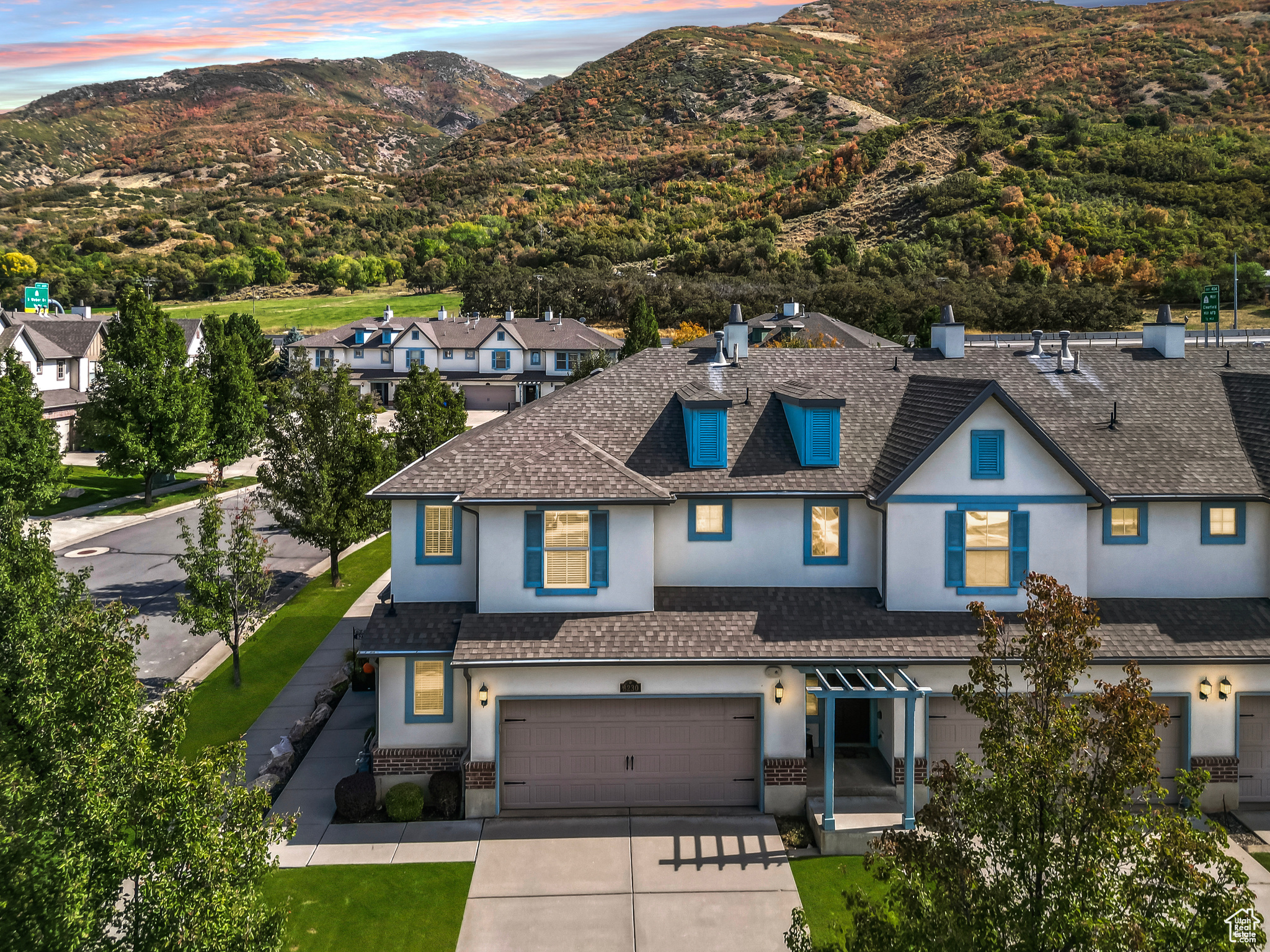 Welcome to your South Weber retreat! This beautifully maintained end-unit townhome offers stunning mountain views and a peaceful setting while keeping you close to shopping, schools, and easy I-84 access. Featuring 3 bedrooms, 2.5 bathrooms, a spacious 2-car garage and covered patio, this home is designed for comfort and convenience! The primary suite boasts a large walk-in closet and a large bathroom. The open main level is ideal for gatherings with upgraded flooring and carpet. Extra guest parking is available behind the home, and all kitchen appliances, with the exception of the fridge, are included. A rare find in this price range... Schedule a showing today before it's gone!