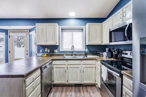 Tiny photo for 6073 W EAGLES PEAK CV S, West Valley City, UT 84128 (MLS # 2136414)