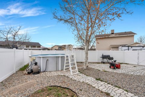 Tiny photo for 6073 W EAGLES PEAK CV S, West Valley City, UT 84128 (MLS # 2136414)