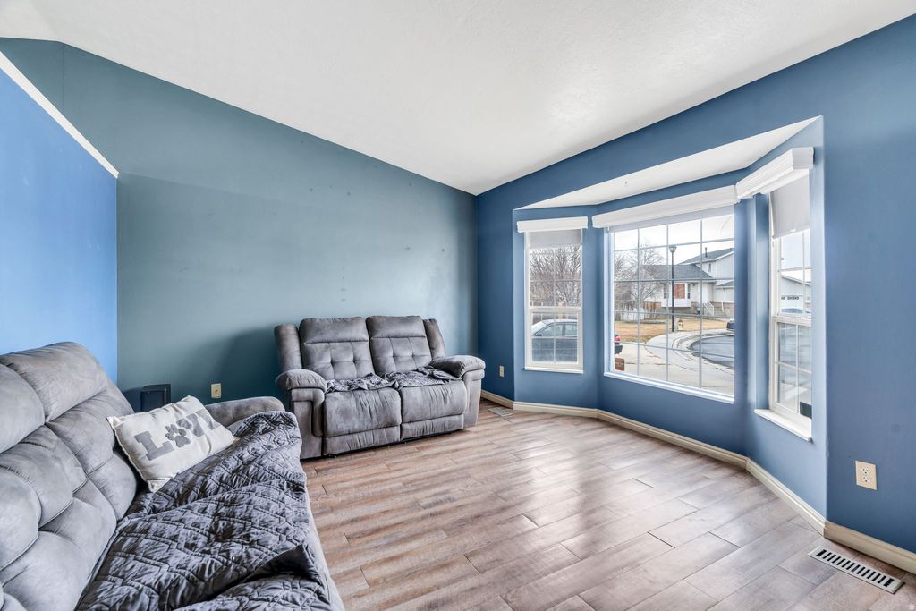 Photo of 6073 W EAGLES PEAK CV S, West Valley City, UT 84128 (MLS # 2136414)