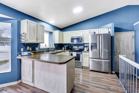 Tiny photo for 6073 W EAGLES PEAK CV S, West Valley City, UT 84128 (MLS # 2136414)