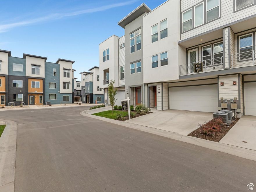 A stunning two-bedroom, 2.5-bath townhouse boasting neutral color palette, durable LVP flooring, quartz countertops, and white cabinetry. Highlights include vaulted ceilings, a spacious two-car garage, and a private balcony. Conveniently located within walking distance to Station Park and its many shops, restaurants, and amenities. This home won't last-reserve your viewing now!