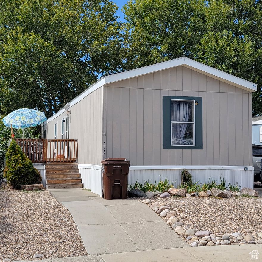 3 bedrooms, 2 bath, manufactured home located in desirable location. Home features central air and furnace installed approximately 5 years ago. Fenced yard, perfect for pets, and off-street parking for 3 vehicles. One side of home has a master suite with full bath. The other side is 2 bedrooms and a full bath. Open feel in living room - kitchen, dining area. Tall ceilings and deck area outside of front door. Area for small garden. The mobile home park features pool, clubhouse, and parks. Close to shopping, schools, and beautiful view of the mountains. A great place to make your home! Equal Housing Opportunity.