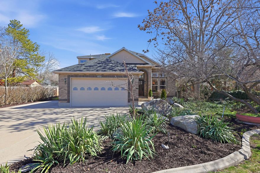 Ideally tucked away at the end of a quiet cul-de-sac, you will find a truly one-of-a-kind two-story home where thoughtful design, artistic craftsmanship, and everyday comfort blend beautifully. Lovingly cared for and filled with distinctive custom details, this home offers a warm and inviting atmosphere the moment you step inside. Natural light pours through the open floor plan, highlighting the unique architectural touches and creative upgrades that make this home so special. At the heart of the home is an extraordinary custom kitchen that feels as much like a work of art as it does a place to gather. The stunning solid redwood cabinetry-expertly repurposed from the historic Great Salt Lake causeway-creates a rich and meaningful focal point, perfectly complemented by elegant granite countertops and a convenient butler's pantry. It's a space designed for inspired cooking, memorable entertaining, and everyday connection. The home's flexible layout offers multiple living areas, including two cozy family rooms and a spacious second-floor loft. The main level primary suite serves as a peaceful retreat, featuring an ensuite bath with double vanities, an oversized soaking tub, and dual walk-in closets. Upstairs, two additional bedrooms and a full bath offer comfortable accommodations for family or guests. With its blend of artistic craftsmanship, custom materials, and inviting living spaces, this exceptional home offers far more than beautiful design-it offers a truly inspired place to live. Situated on a beautifully maintained 0.23-acre west-facing lot, the backyard is a true retreat-fully fenced and thoughtfully designed for both relaxation and enjoyment. Here you'll find a stamped concrete patio, a peaceful pond, mature trees, lush landscaping, and a raised-bed vegetable garden, all coming together to create a private outdoor oasis that is both serene and rare. With close proximity to top-rated schools, shopping, dining, parks, and mountain recreation, this location offers the perfect balance of convenience and lifestyle. This is more than just a home-it's a place where everyday living feels truly special.