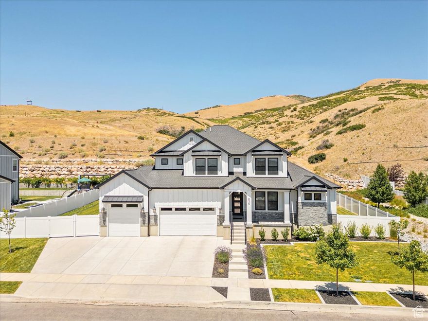Welcome home! From the bright and airy kitchen/butler's pantry, one-of-a-kind primary suite, custom basement design and secluded backyard with mountain views, its evident that no expense was spared in the design of this incredible property! Your main level primary suite features back deck access, large windows with mountain views, auto-roller shades and a spacious bathroom with a custom-designed open air shower, stand alone tub, massive walk-in closet and in-suite washer and dryer. Enjoy sunsets from your uniquely private, mountain view, backyard. This outdoor oasis also features a sidewalk track, RV-parking, basketball standard, in-ground trampoline, covered patio and direct access to walking/biking trails. After an evening in your yard, it's time to relax and unwind in your spacious custom basement. This incredible space features a massive living area with a built-in surround sound system, entertainment/game space, spacious bar area with sink & mini fridge, oversized playroom, plus guest room and office space. This unique home is priced to sell fast, don't miss it!  Sellers are willing to include primary bedroom washer and dryer, basement pool table, basement sectional, bar mini fridge and both kitchen refrigerators. Some other furniture negotiable.  Square footage figures are provided as a courtesy estimate only and were obtained from appraisal. Buyer is advised to obtain an independent measurement.
