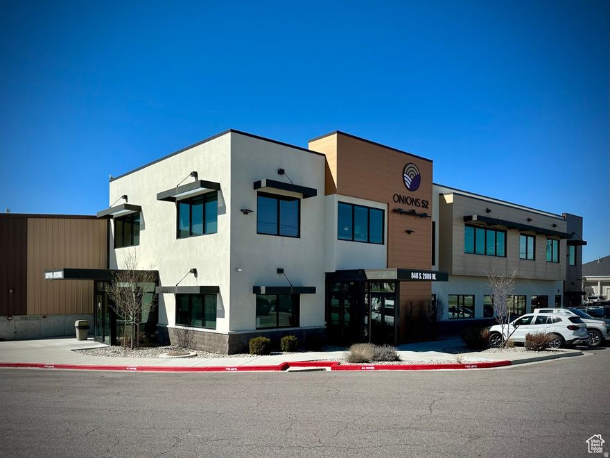 Introducing an unparalleled opportunity in the heart of Davis County, Utah  your premier industrial/office destination. Spanning an impressive 135,840 total sq.ft. on 9.147 acres. Conveniently situated with easy access to HWY 193, I-15, and the West Davis Corridor, this location offers strategic connectivity for streamlined transportation and enhanced market access. The building breakdown is as follows: Building 1: New Warehouse - 46,200 sq.ft. / New Office 10,637 sq.ft. = 56,837 sq.ft. (Lease price $12/psf) Building 2: Warehouse - 18,000 sq.ft. (Yr. Built - 2016) (Lease price $7/psf) Building 3: Warehouse - 18,000 sq.ft. (Yr. Built - 2010) (Lease price $7/psf) Building 4: Warehouse 39,483 sq.ft./ Office 3,520 sq.ft. = 43,003 sq.ft. (Yr. Built - 1945 warehouse, 2008 office) (Lease price $10/psf) The new warehouse (Building 1) features 68' x 250' and 68' x 175' clear span sections with a ceiling height of approx 26'. The upstairs in the new office features 7 executive office suites (4 with private restrooms), a break room, two additional 3-stall bathrooms, and an ample open space for portable cubicles, etc. The main floor features a 28'x 21' conference room, a 37' x 26' weight/ exercise room, reception and lobby area, storage rooms, and multiple convenient access to the attached warehouse. The warehouse features two large 4-stall bathrooms, a 1,000 sq.ft. break room, four loading docks, 5,000 sq.ft. of mezzanine space, and 3 overhead doors (16' x 14', 14' x 14', and 12'x12'). Buildings 2 and 3 are climate-controlled and feature three 16' x 14' overhead doors. All warehouse space has concrete floors and is very well maintained. Building 4 features large offices, a break room, conference rooms, 3 more loading docks, multiple sections of indoor storage, and covered outdoor storage.