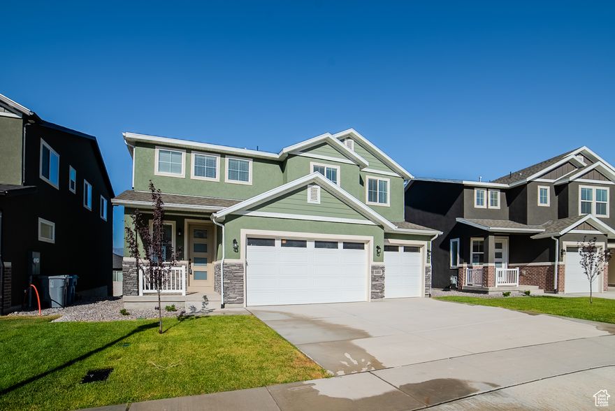 Beautiful daylight basement! Designer  finishes: tile backsplash, full tile primary bath, quartz countertops, stainless steel appliances, black railing and black hardware. Park just a block away, beautiful lake views, and walking trail nearby.