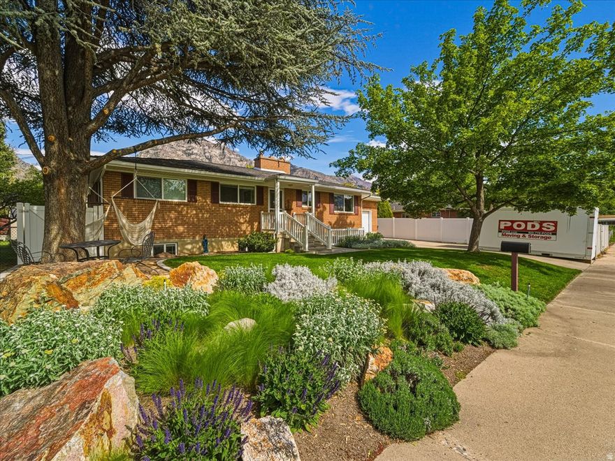 Darling Pleasant View rambler in an unbeatable location just one block north of BYU Stadium! Zoned for an accessory apartment (owneroccupied), this home offers strong income potential with a basement apartment featuring a separate exterior entrance, second kitchen, and its own laundry. Inside, enjoy hardwood floors, newer windows, and a bright, functional layout. Major upgrades include a brand-new HVAC system, a new water heater, all new plumbing, and a sewer lateral sleeved in 2025. Outside, a beautifully manicured yard with mature shade trees and waterwise landscaping creates a charming, inviting outdoor lifestyle. Located near highly rated schools, including Timpview High School and Rock Canyon Elementary, with easy access to shopping, dining, trails, and all that Provo has to offer.