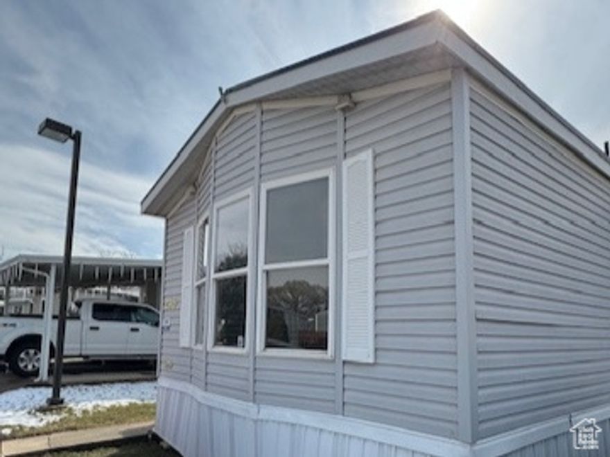 Welcome to this beautifully maintained 3-bedroom, 2-bath home in Camelot Community! This gem features a new TPO roof and upgraded 4" plumbing, giving you peace of mind for years to come. Inside, you'll enjoy an open layout with plenty of natural light, central A/C for comfort, and thoughtful updates throughout. The community offers great amenities including a clubhouse and swimming pool, plus easy access to I-15, shopping, and dining. Whether you're just starting out or looking to downsize, this home is move-in ready and waiting for you!