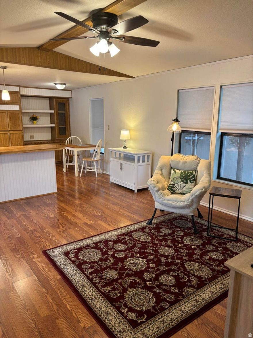 Discover this well-maintained 1992 Nashua home, showcasing pride of ownership in the desirable Paradise Palms 55+ community. The HOA fee covers lot rent, basic cable TV, and common area maintenance, ensuring a hassle-free lifestyle.  Home Features: Thoughtfully designed 2-bedroom layout, with bedrooms located on opposite ends for added privacy. Tandem 2-car carport plus a storage shed for extra convenience. Low-maintenance yard, perfect for seasonal or full-time living--no lawn mowing required! Prime Location: Minutes from shopping, medical facilities, restaurants, and scenic walking trails. Important Details: ALL buyers must be HOA-approved before the seller can consider an offer.