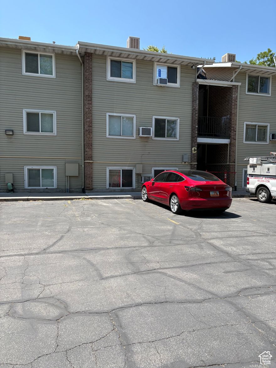 New flooring, and paint though out. Great affordable 2 bed 1 bath Condo, in a gated Salt Lake City community. Matured trees stand beautifully outside the windows and has 1 designated covered parking spot. HOA covers water, sewer, garbage, landscape, and gate maintenance, and swimming pool (under renovation). All appliances included, even the stackable washer and dryer. Desirable top floor unit. Proof of funds or prequalified letter must be submitted with all offers. Buyer to verify all info.