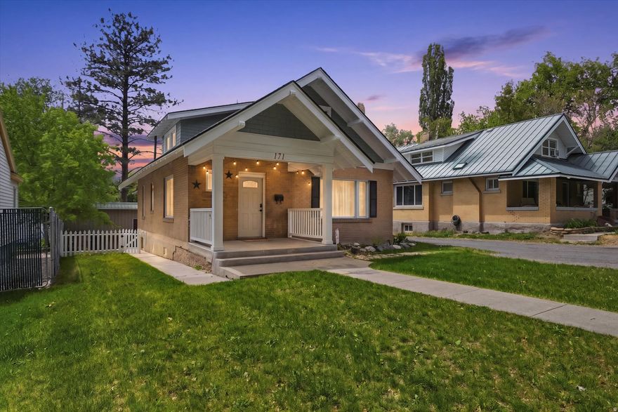 Welcome to your new favorite house - this sweet Craftsman Charmer! It perfectly mixes that warm, classic Craftsman character with a bunch of smart modern updates, so you get the best of both worlds. Step inside to find four spacious bedrooms, one full bathroom, and two half baths. The updated kitchen features modern finishes and flows effortlessly into the living spaces. A cozy fireplace serves as the heart of the home, creating a warm and inviting atmosphere perfect for relaxing evenings. Throughout the home, you'll appreciate the fresh paint, updated flooring, and thoughtful updates that respect the home's original craftsmanship. Outside, enjoy the beautiful front porch - ideal for morning sunrises and neighborhood watching - and the large covered back porch, perfect for entertaining or unwinding. The fully fenced backyard provides privacy and plenty of room for pets, play, or gardening. Major systems and components have been thoughtfully updated, including a roof, furnace, and A/C, giving you peace of mind for years to come. Call to schedule your showing today!