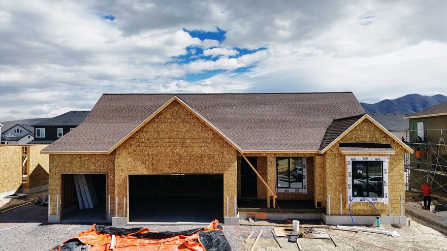 The Autumn floorplan in Sage Park on a West Facing Lot! This highly sought-after rambler offers 3 spacious bedrooms and 2 1/2 bathrooms all on the main level, with a smart, open-concept design and upgrades throughout. Step into the massive great room featuring 12-foot ceilings and a gas fireplace, oversized windows, and seamless flow into the gourmet kitchen with quartz countertops, a gas range, and beautiful finishes throughout. 9-foot ceilings on the Main level, The luxurious primary suite features a vaulted ceilings, a spa-like bathroom featuring a separate soaking tub and walk-in shower, double sinks, and a large walk-in closet. Don't forget the 9' basement with entrance for future ADU.