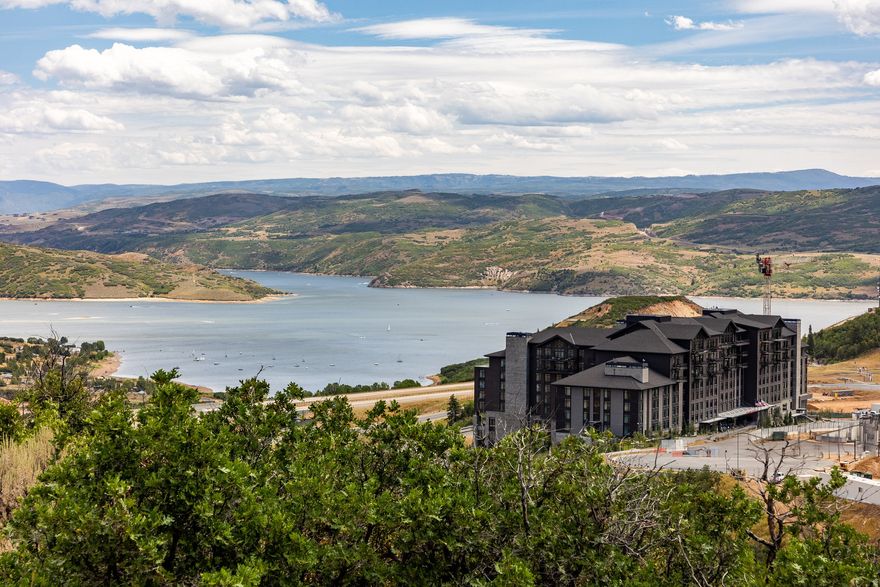 Perched high on a hill with spectacular views of Deer Valley peaks and Jordanelle Reservoir, and an opportunity to obtain a highly coveted Marcella Club membership, this homesite is a fantastic choice for your custom mountain retreat. Nestled beside a plethora of shopping, dining, and entertainment options in the up and coming Deer Valley East Village, and paired with Marcella Club's world class amenities, you will always have options to play, relax, and recharge. Building is not required, but when you are ready, this site allows your custom home to be as large as 10,000 square feet. The Marcella Club is a private, member only club, and will be considered one of the most exclusive clubs in the country, with only 500 full (SOLD OUT) memberships. This exclusivity will give our members the best golf and ski club experience possible, with an emphasis on comfort, convenience, fun for families, and unparalleled luxury without the pretense that comes with many clubs. Enjoy our future 46-hole golf facility anchored by the new 18-Hole Tiger Woods Design championship golf course overlooking the entire Heber Valley, Jordanelle Reservoir, Wasatch Mountains, and the Uinta-Wasatch-Cache National Forest. Marcella's golf experience will be the best in the state of Utah as it traverses valleys, beautiful groves of trees, and a ridgeline that offers some of the most dramatic views of any golf course in the nation. Purchase of this lot allows buyer to apply for Marcella Golf & Ski membership, subject to Marcella approval. Membership deposit is funded separately by the Buyer.