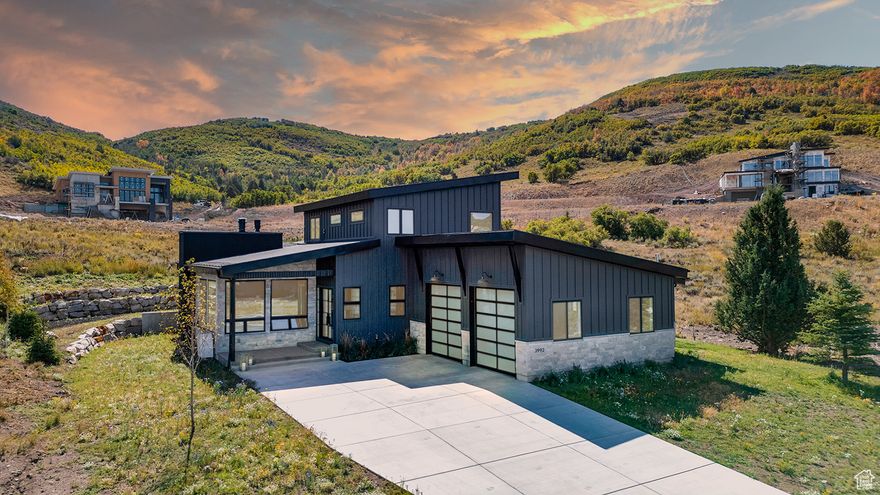 Perfect primary home or vacation retreat! Situated above the Jordanelle Reservoir, adjacent to Victory Ranch and the new Marcella East development, this beautiful new Mountain Contemporary home was completed January 2025. Located just 5 minutes from the Jordanelle boat ramp, 15 minutes from Deer Valley East Village, 10 minutes to both Heber and Kamas and 20 minutes to both the Uintas and Wasatch mountains. Enjoy brilliant sunsets over Deer Valley from either the family room, hot tub or at the firepit. This beautiful  home features three en-suite bedrooms, a loft space upstairs, home office space, an oversized garage with plenty of room for gear and toy storage and an aspen enclosed outdoor dining space. A true chefs kitchen with a scullery pantry, SubZero refrigerator, Wolf Range and Bosch dishwasher along with custom painted cabinets, an oak island and floating shelves.. A NanaWall window opens from the kitchen to the outside bar, perfect for passing food and drinks to friends and family. Fireplaces in both the family room and primary bedroom for relaxing evenings. The primary suite features a large bathroom with a steam shower and large walk in closet with custom cabinetry. Home features include radiant floor heat, fiber optic internet service and a Sonos stereo both inside and outside on the beautiful covered patio. The ground floor is over a full crawl space providing ample storage.
