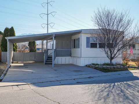 Photo of 3775 S FISHER WAY W #103, West Valley City, UT 84119 (MLS # 2140856)