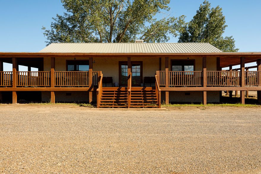Imagine waking up every morning to 360-degree views of canyon country from your own wraparound covered porch. This extraordinary live-work property in the historic Paria River Valley offers a rare chance to call one of the most scenic places in America home. The one-bedroom residence with private bath provides comfortable, full-time living on 2.4 acres of commercially-zoned land - perfectly suited for an owner-operator, artist, entrepreneur, or wilderness lover ready to build a life as breathtaking as the landscape around them. Located at 2040 Long Canyon Road, New Paria, UT with direct Highway 89 frontage - the main corridor connecting millions of annual visitors between Grand Canyon, Lake Powell, Zion, and Bryce Canyon National Parks - this property enjoys extraordinary visibility and year-round visitors with virtually no surrounded by protected wilderness. What truly sets this property apart: it is one of the only private commercial inholdings within Grand StaircaseEscalante National Monument, adjacent to Vermilion Cliffs Wilderness and National Monument. You simply cannot buy this kind of position anymore. The 1,344 SF turn-key building has been operating since 1998 and includes a fully operational professional kitchen, dining and retail space, a private residential suite, and restrooms - all wrapped by a sweeping covered porch with panoramic red rock views of the Paria River Valley. The 2.4-acre lot offers ample room for expansion, whether that's additional guest quarters, a garden, event space, or whatever vision you bring. Live here. Run a bed & breakfast, caf, trading post, guided tour operation, or retreat center. Host weddings under canyon skies. Or simply enjoy the most spectacular backyard in Utah. Grand StaircaseEscalante. Vermilion Cliffs. Paria Canyon. Coyote Buttes & The Wave. Lake Powell. All at your doorstep. Seller Finance / Owner Finance offered, contact agent for details.