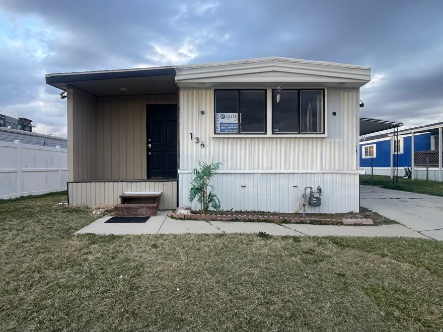 Perfect starter home awaits you in Sandy!  Location! Location! Location!    Central A/C!  The home features 2 bedrooms and 2 bathroom with a bright open-concept living area and a generously sized kitchen, perfect for every day living area and entertaining.  The property also offers potential to add another bedroom and bathroom, giving buyers the opportunity to customize and add value Don't miss this opportunity. The property is being sold as is.  Affordable & Flexible Financing: Manufactured homes offer incredible value-and now with easy, more affordable financing, contact me for more information.