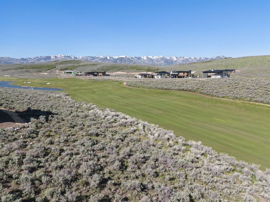 Perched above the 10th fairway of Promontory's renowned Nicklaus Painted Valley Course, this extraordinary 1.1-acre buildable lot in the exclusive Vista Point community offers an unparalleled opportunity to craft your dream mountain home. With expansive ski resort and golf course views, the property provides walkable access to the Nicklaus clubhouse, home to The Peak restaurant and Sage Spa. The coming soon third gate entrance off Browns Canyon Road, will greatly enhance accessibility to Park City and its surrounding adventures. Promontory's exceptional amenities elevate this lot from mere real estate to a lifestyle destination. Owners can enjoy two spectacular 18-hole golf courses, a new par 3 course, seven distinctive restaurants, a beach club, outdoor opportunities such as fishing and water sports at the Jordanelle Reservoir, and members-only lodges at both Park City Mountain Resort and Deer Valley. All of these world-class experiences are just a short 20-minute drive from the historic charm of Park City's Main Street, making this Vista Point lot the perfect destination for your dream home in the mountains.