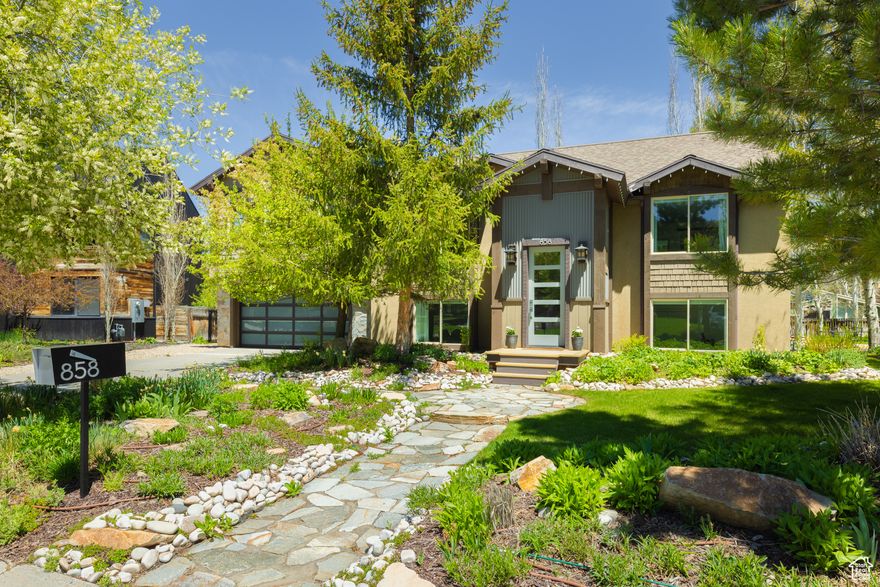 Welcome to 858 Red Maple Ct, a beautifully remodeled home in the highly sought-after Park Meadows neighborhood of Park City. This 4-bedroom, 4-bath home offers 2,583 square feet of thoughtfully designed living space over two levels, with the main highlights being the custom remodel and the stunning views from the great room. From here, you'll enjoy sweeping vistas of the mountains and Park City Mountain Resort-truly a one-of-a-kind setting with wrap-around windows giving views in every direction.  The home's open-concept layout, beautiful finishes, and expansive windows create a light-filled, modern living space that seamlessly connects the open kitchen to the brand-new back deck and the mature and private yard. Located on a quiet cul-de-sac, this home offers both privacy, a safe street for young families and accessibility, with easy access to the bus route, skiing, walking paths, and the local's favorite bike park.  For those seeking even more space, the property has custom plans for expansion, making this an incredible opportunity to tailor the home to your exact needs while maintaining the beauty of this stunning lot. Park Meadows is one of the most desirable neighborhoods in Park City, beloved for its central location, outdoor recreation opportunities, and serene, friendly atmosphere.  With unparalleled views for this lower area of Park Meadows, a gorgeous remodel, and the potential for future expansion, this is a rare opportunity to own in one of the best locations in Park City.