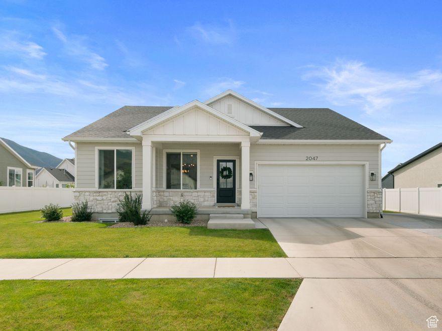 Located in a quiet, family-friendly neighborhood, this stunning Mapleton home offers comfort, style, and convenience-all with breathtaking mountain views. Just a short walk to Maple Grove Park and minutes from shopping, dining, golf, pickleball, and so much more, this home is perfectly situated for both relaxation and recreation. This home is packed with thoughtful upgrades including quartz countertops, modern cabinetry, upgraded fixtures, and a cozy fireplace. Large windows fill the home with natural light, highlighting the blend of LVP and plush carpet flooring for both durability and comfort. The fully finished basement is complete with its own private entrance, a spacious kitchen, generous living area, and plenty of room for family, guests, or rental opportunities. The basement apartment is currently rented for $1,500 per month. Other features include a large driveway for ample parking and an open, versatile layout designed to fit today's lifestyle needs. Only two years old, this home is better than new with its modern upgrades, and fully finished living space. With its unbeatable location, this Mapleton gem is waiting for you to call it home. Square footage figures are provided as a courtesy estimate, buyer is advised to obtain their own measurement. Home is owned by the agent.