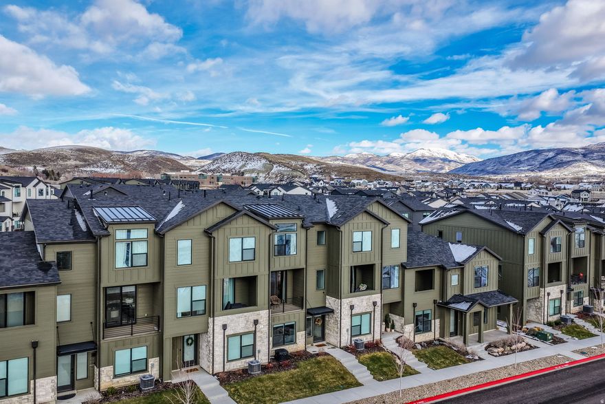 Breathtaking mountain views of Thurston Peak, short-term rental approved townhome ideally located in Mountain Green at the foot of Trappers Loop, just minutes from Snowbasin Resort and Pineview Reservoir. This beautifully designed residence offers 3 bedrooms, 3.5 bathrooms, and a 2-car garage, combining modern finishes with exceptional mountain living. The kitchen is finished with quartz countertops, 42-inch upper cabinets, Delta faucets, and stainless steel appliances. Enjoy outdoor living with breathtaking mountain views, along with resort-style community amenities including a pool, hot tubs, pickleball courts, playground, outdoor Fireplace and BBQ area. Easy access to outdoor recreation, skiing, hiking, boating, and year-round adventure makes this an exceptional primary residence, second home, or investment property. Owner/Agent.