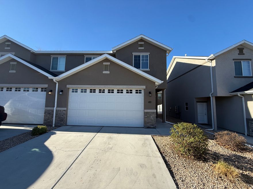 Beautiful townhome located in the desirable Stone Gate subdivision. Functional floor plan with lots of natural light & kitchen, living & dining area all on the main floor! Great location just 5 minutes away from downtown Cedar City. Property comes with refrigerator, washer & dryer. Attached 2 car garage. Private backyard fully fenced off with a concrete slab back porch. Schedule a showing to see this townhome for yourself today!