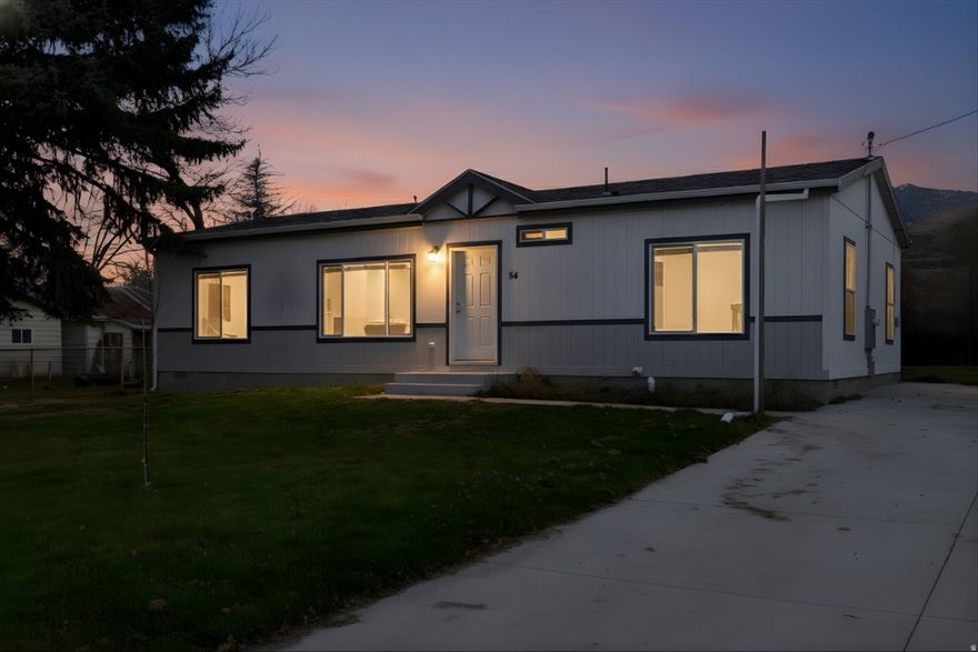 Great Starter Opportunity! This near new home offers comfortable living with an open kitchen and great room concept, perfect for everyday life and entertaining. The spacious primary suite features a double vanity and a large soaker tub for relaxing at the end of the day. Enjoy outdoor living with mountain views on the large back patio. Mature trees and fruit trees add privacy and charm. Conveniently located just minutes from Cherry Peak Ski Resort, grocery stores, and gas stations. Walking distance to the elementary school and only a couple miles from the middle school. Don't miss this affordable and inviting home with so much to offer! Square footage figures are provided as a courtesy estimate only and were obtained from Blue Prints. Buyer is advised to obtain an independent measurement and verify all other info.