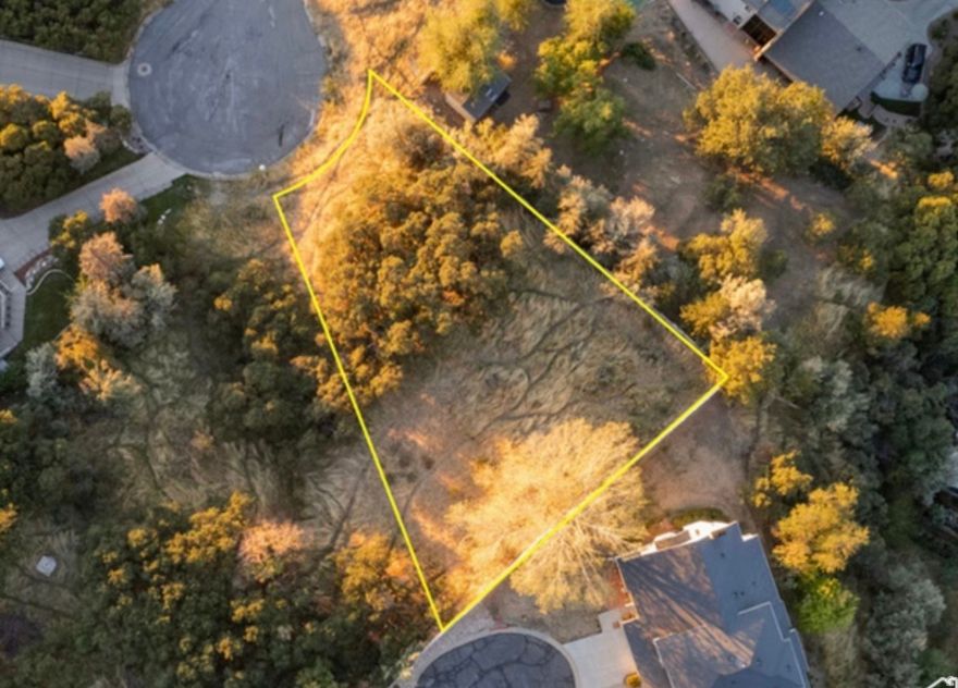 Prime East Bountiful Lot with Stunning Valley Views!  Discover the perfect canvas for your dream home with this exceptional 0.34-acre residential lot nestled in a serene cul-de-sac in East Bountiful. Boasting breathtaking lake, mountain, and valley views, this lot offers a peaceful retreat while still being conveniently located near essential amenities. With no HOA restrictions, you have the freedom to build the home you've always envisioned. The lot is zoned for single-family residential use and is surrounded by beautiful scrub oak for added privacy and natural charm. Don't miss this rare opportunity to secure your slice of East Bountiful's beauty.  Act now and make your vision a reality!
