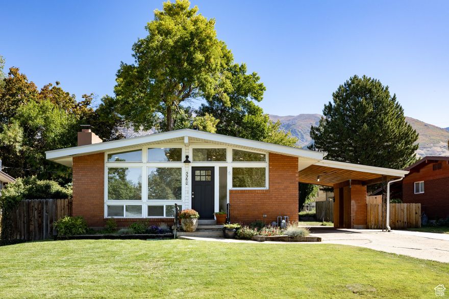 Charming Brick Rambler with Mother-in-Law Apartment in Ogden. This well-cared-for raised rambler featuring 2,296 sq. ft. of comfortable living space. Situated on a private lot directly across from an elementary school, this home offers both convenience and privacy located just minutes from Weber State University. The main level includes 3  bedrooms and 2 bathrooms, with thoughtful updates throughout, including refreshed bathrooms, new flooring, and modern paint. A warm brick exterior adds timeless character, while large windows invite natural light into the open living areas. Downstairs, you'll find a full second kitchen, 2 additional bedrooms, and 1 full bathroom-perfect for a mother-in-law setup, extended family, or rental potential. The home has some outstanding updates over the years, new windows, converted to central air, and a new roof and water heater have been installed this year.