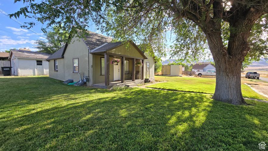 Beautifully remodeled home in charming Fountain Green! Enjoy new electrical, plumbing, furnace, water heater, roof, flooring, cabinets, and paint-truly move-in ready. Includes detached garage, RV pad, and all appliances. Relax on the covered porch or enjoy the .24-acre yard with mature trees and sprinklers. Small-town living just 14 miles from I-15 in Nephi-peaceful, convenient, and ready for you!