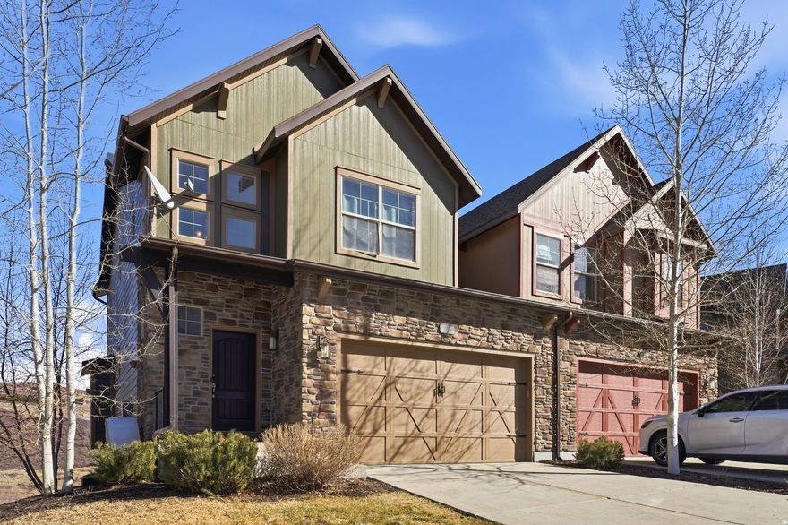 Experience mountain living in this stunning 4 bedroom, 3.5-bath townhome in the sought-after Retreat at Jordanelle, just five minutes from Deer Valley East and Jordanelle Reservoir. This home spans nearly 2,700 square feet, this residence blends modern elegance with serene views of open space and a neighborhood park, offering privacy and the rare perk of nightly rentals. The main level welcomes you with a cozy fireplace-warmed living area, a gourmet kitchen with an island, and a deck perfect for entertaining. Upstairs, the spacious primary suite features a walk-in closet and tranquil views, joined by two bedrooms, a full bath, and a convenient laundry room. The walk-out lower level offers a versatile den, a hot tub on a private patio, a firepit, a fourth bedroom, and a full bath-ideal for guests.  2-car garage provides ample storage. The HOA covers exterior maintenance, landscaping, and snow removal, complementing community amenities like a clubhouse, fitness center, pool, and playground. Just ten minutes from Park City and five minutes from skiing or summer adventures at the reservoir, this townhome delivers the perfect balance of relaxation and resort-style living.