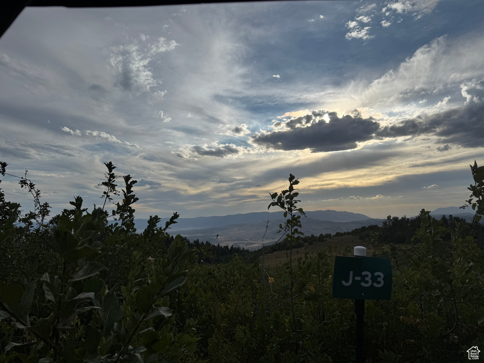 Skyline Mtn 1 Acre View Lot J-33 which is close to the top of the resort. Lot J-32 right next door to the North is available as well for more room. The lot is on the West side of Chokecherry Dr with a natural entrance and slopes down to the West with an awesome view of the Sanpete Valley. It's never been used so it is a blank canvas for your dreams and ideas. A buyer could make an excellent camp spot with some brush clearing, hardly any excavation needed. Bring your trailer or build a cabin and take advantage of all that mountain life has to offer. Amenities include a pool, playground, pickle ball, tennis courts, and a golf course. In the Summer there are BBQ's and musical groups, along with endless recreational activities including hiking, mountain biking, four wheeling, dirt biking, and more plus nearby lakes, fishing, hunting, rock climbing and the Drive-inn theater in MP. Access in the winter is by tracked vehicles approximately Dec-May. The mountain air is cool, clear, and crisp, and the night sky is bright and vivid. Close to grocery stores, pharmacy, restaurants and other amenities. Culinary water is available to haul from Skyline Mountain Resort well about .5 mile away. Power is available with a connection fee. Buyer to verify all information.