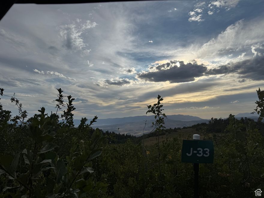 Skyline Mtn 1 Acre View Lot J-33 which is close to the top of the resort. Lot J-32 right next door to the North is available as well for more room. The lot is on the West side of Chokecherry Dr with a natural entrance and slopes down to the West with an awesome view of the Sanpete Valley. It's never been used so it is a blank canvas for your dreams and ideas. A buyer could make an excellent camp spot with some brush clearing, hardly any excavation needed. Bring your trailer or build a cabin and take advantage of all that mountain life has to offer. Amenities include a pool, playground, pickle ball, tennis courts, and a golf course. In the Summer there are BBQ's and musical groups, along with endless recreational activities including hiking, mountain biking, four wheeling, dirt biking, and more plus nearby lakes, fishing, hunting, rock climbing and the Drive-inn theater in MP. Access in the winter is by tracked vehicles approximately Dec-May. The mountain air is cool, clear, and crisp, and the night sky is bright and vivid. Close to grocery stores, pharmacy, restaurants and other amenities. Culinary water is available to haul from Skyline Mountain Resort well about .5 mile away. Power is available with a connection fee. Buyer to verify all information.