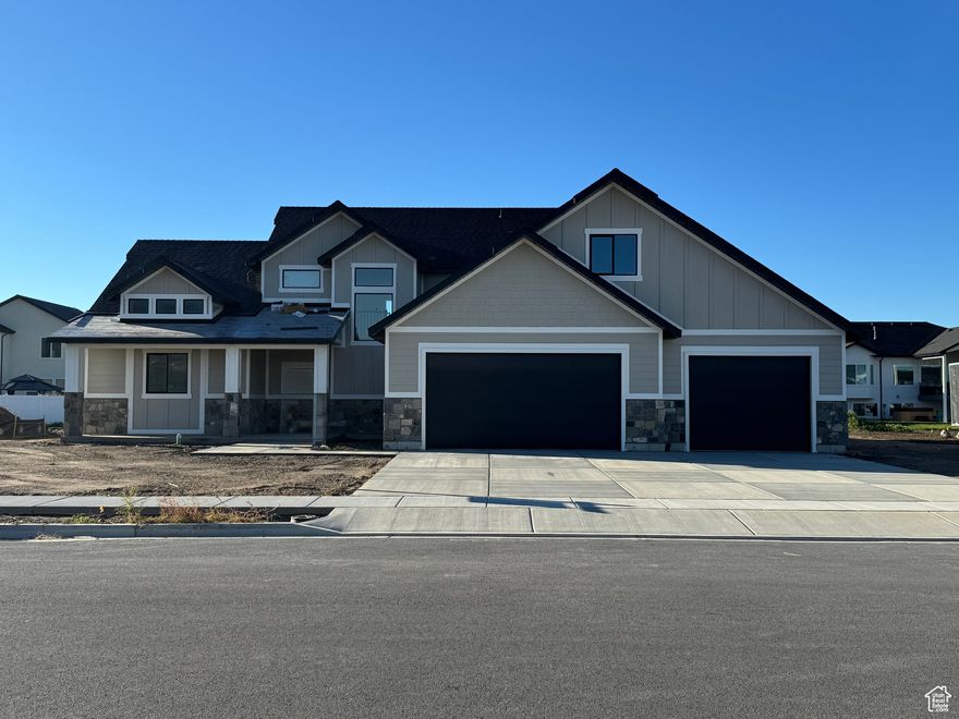 This is a Custom Buit Home by Gray Stone Development Inc.  Work directly with the builder.  A 2-Story with everything included in the price. Including: quartz countertops, custom painted cabinets combined with stain. Spacious kitchen and butler pantry.  Extra-large kitchen island with 6cm quartz tops.  Upgraded tile throughout the house with fun patterns.  Unpeckable finish work with accent walls throughout the house.  Barn door in the master bedroom.  2 sinks, free standing tub, separate toilet room in the master bathroom, stackable washer and dryer in the master closet.  Large family room upstairs and also a bonus room that could also be used as a bedroom.  Main bath has tub and toilet separated to be more functionable. Laundry room upstairs for convenience.  The exterior of the home is constructed of real stone.  This will be a quality-built home.
