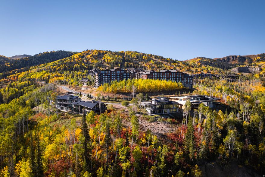 Moonshadow G represents one of the final new-construction, single-family opportunities in Empire Pass, positioned within Deer Valley's most exclusive alpine enclave. What truly sets this residence apart is its commanding west-facing orientation, capturing sweeping views across Deer Valley Resort, Park City Mountain Resort, and the lights of Historic Main Street below-a rare visual corridor that few homes in Empire Pass can offer. Designed in a refined mountain-modern aesthetic, the home balances architectural presence with livability. Expansive walls of glass frame sunsets, ski runs, and Old Town vistas while filling the interiors with natural light throughout the day. Open-concept living spaces flow seamlessly to heated outdoor decks, creating an effortless connection between interior comfort and alpine surroundings in every season. Located in the Moonshadow neighborhood of Empire Pass, ownership delivers immediate proximity to Deer Valley's ski access, Silver Lake Village, and Upper Deer Valley amenities, while remaining just minutes from Main Street Park City-a rare combination of altitude, access, and visibility. Membership for Talisker Club is included and further elevates the offering, providing access to the private Tower Club, spa, dining, fitness, and the Mark O'Mearadesigned golf course at Tuhaye. Moonshadow G is not simply another luxury residence-it is a finite opportunity to own new construction with iconic westward views in a neighborhood where future supply is effectively exhausted.