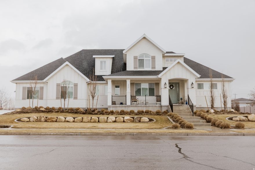 Exquisite Executive home in highly desirable Lehi neighborhood.  Showings will begin on May 2, Open House 11-4pm. Home boasts all the upgrades and professional finishes. With high vaulted ceilings and a wide open floor plan, home has the perfect feel and flow.  Large primary suite on the main level with oversized bathroom and closets. Kitchen is gorgeous from designer cabinetry to high end countertops. Basement is professionally finished with large bedrooms, huge family room, and a mother in-law apartment ideal for renting.  Home sits on a big property over a half acre ideal for entertaining and recreation.  This is a must see!  Ask about the assumable low interest loan.