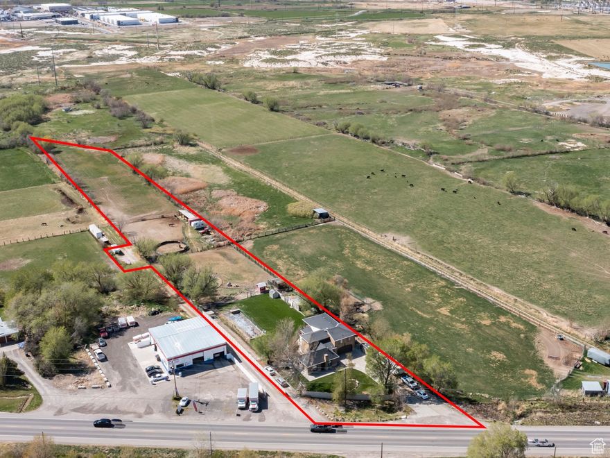 Prime Development Land-Banking Opportunity in Springville's Dry Creek Master Plan (see attached pdf), perfect for future mixed-use development. The true value lies in the land, with strong potential for long-term appreciation and strategic growth. Infrastructure Proximity: Sewer is approximately one mile north on SR-51 at 1695 South. Over 30 contiguous acres to the west are available for a potential sale or joint-venture development. The sale includes a home with an attached Accessory Dwelling Unit (ADU) (see MLS Listing #2080827), offering rental or interim use. Water Access: The property operates on a reliable well system. Additionally, an irrigation water right is available for separate purchase.