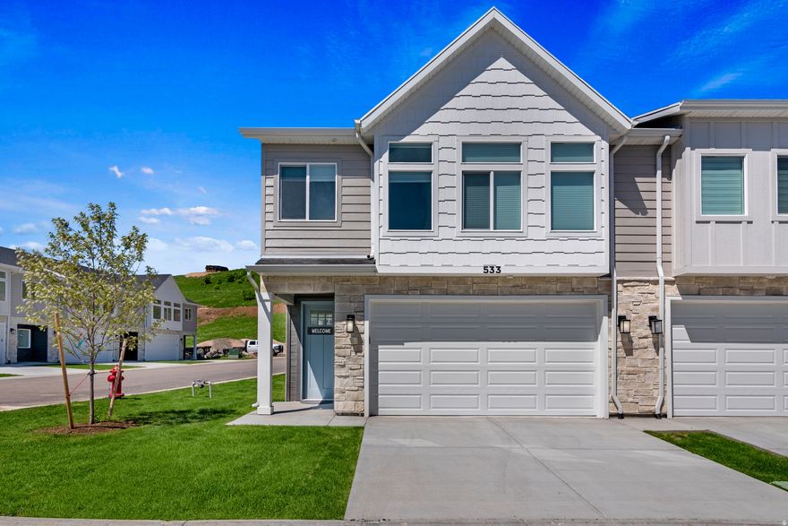 This may be the nicest townhome in all of Paradise Parkway! End unit with southern exposure and additional windows, providing an open feel and much more natural light. Grass lawn on three sides of the property with Boat/RV parking right out the front door. Thousands of dollars invested in upgrades! Fully finished garage with epoxy floors, updated light fixtures, and a Level 2 EV charger. A QuietCool whole house fan installed to provide a cool comfortable home and reduce summer AC costs, by up to 80%. Professionally furnished and decorated with solid wood bedroom sets (no particle board), premium mattresses, top grain leather sectional with ottomans, a 3-in-1 game table and video games! There's even a mini fridge and microwave installed in the Great Room so you can enjoy popcorn, snacks, and drinks without going up and down stairs. 65 inch Samsung TVs installed, on wall mounts, in all three bedrooms, with a 75 inch Samsung TV in the Great Room. Device charging made easy with power blocks installed in all bedroom nightstands. The high end refrigerator, washer, and dryer stay with the unit. If you plan to do nightly rentals, this property has achieved Guest Favorite status on Airbnb with a 4.92 rating. Motivated seller will consider all offers.