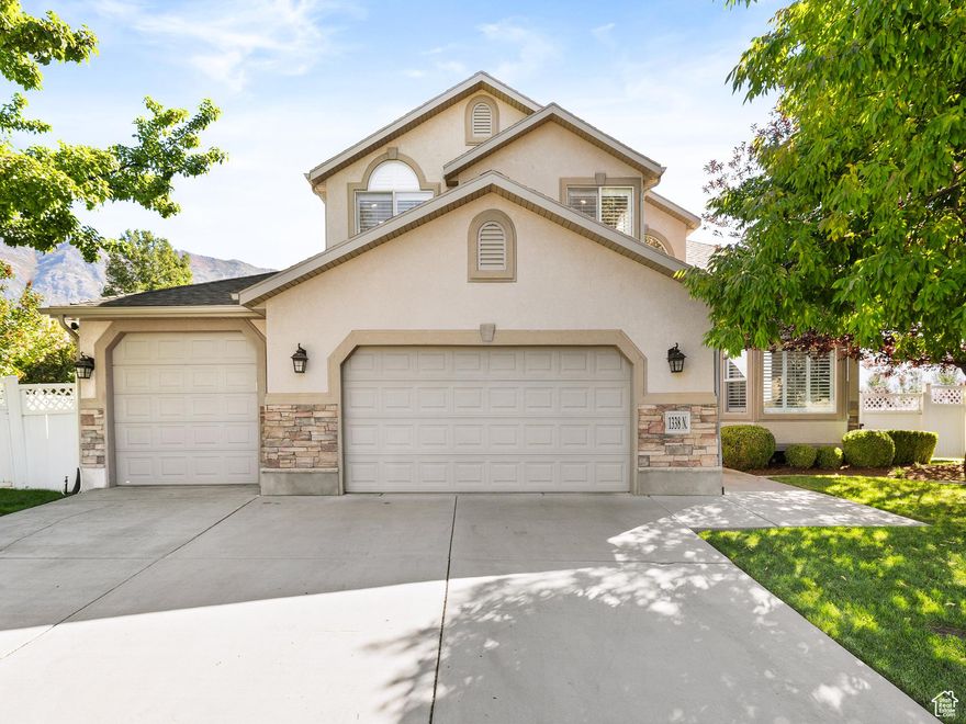 Welcome to this spacious 6-bedroom, 3.5-bathroom two-story home in Pleasant Grove, sitting on a large .35-acre corner lot with more than 4,000 square feet, a three-car garage, and a backyard built for entertaining that features a full in-ground pool, deck, sizable patio, basketball pad that could easily convert to a pickleball court, in-ground trampoline, and mature trees in a fully fenced yard. Inside you'll find hardwood floors, vaulted ceilings, plantation shutters throughout including the basement, upgraded lighting, and a formal dining room currently used as a piano room, along with an upgraded kitchen featuring double ovens and a range hood, plus a cozy fireplace on the main floor. The oversized primary suite offers vaulted ceilings, new carpet installed in 2023, double sinks, a soaker tub, separate shower, and a large walk-in closet, while the upstairs bathrooms are family-friendly with double sinks and a door separating the tub and shower area. All bedrooms are generously sized, and the finished basement includes a mother-in-law apartment with its own covered entrance, a full kitchen with appliances and island, fireplace, large bathroom with double sinks, walk-in closet, and plenty of storage, and can be configured as a one- or two-bedroom apartment, making it ideal for multi-generational living or rental income. This home truly has it all-spacious interiors, a resort-style backyard, and the bonus of an income-producing basement apartment-all in a great Pleasant Grove location.