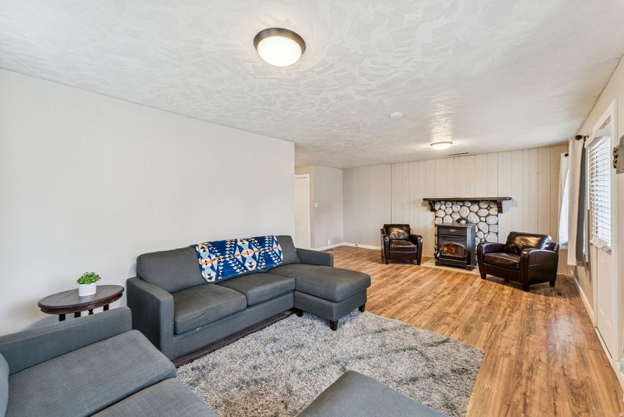 Best Deal in Heber  Updated Cottage at an Unbeatable Price!  At $449,000, this updated 2-bed, 1-bath, 1,504 sq ft Heber home is truly the best value in town. Every major system has been upgraded, including a brand-new sewer line, new A/C, new water heater, energy-efficient windows, quartz kitchen countertops with new backsplash, refreshed bathroom, and durable LVP flooring throughout.   Outside, enjoy a new driveway and carport, detached garage with workshop space, and ample parking. The unfinished basement adds room to grow or create future income potential.   Nestled on a quiet street just minutes from Deer Valley's new East Village, downtown Heber, and Park City, this move-in-ready home delivers modern comfort, unbeatable convenience, and exceptional value. All the big-ticket items are done. Don't miss the best-priced home in Heber! Buyer to verify all info.