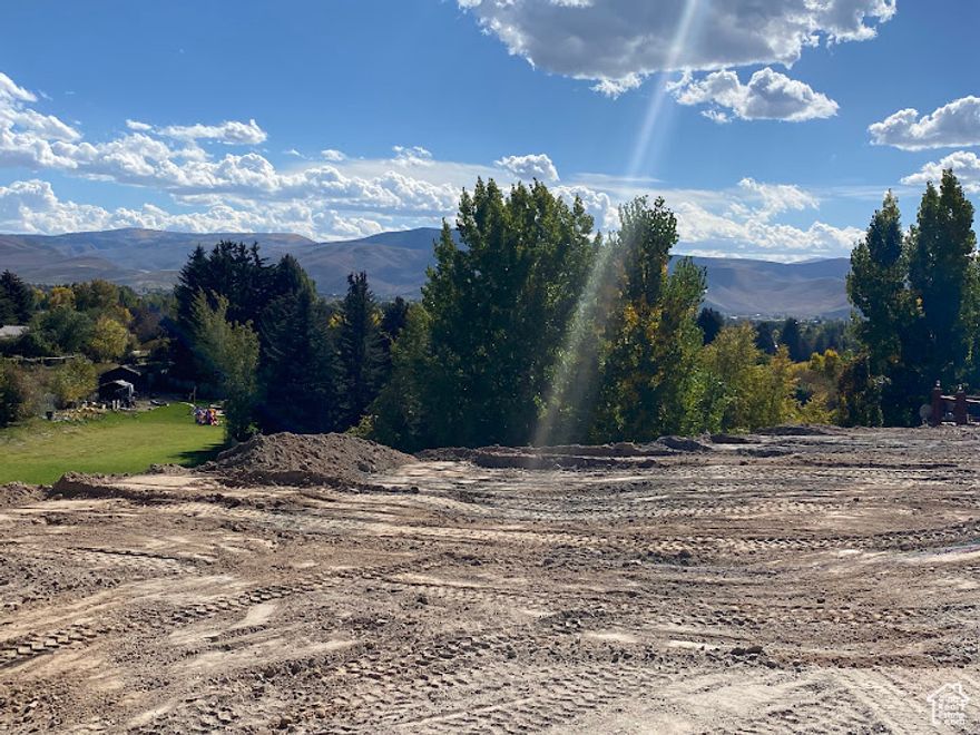 Build your dream home in Heber's desirable Valley Hills Subdivision with stunning mountain and Heber Valley views.  Use tabs and spaces to space info   1- The main floor of your home can be level with the street. The home can be built without stairs at the entry or garage. (I graded a flat area on the front of the lot so you can visualize the elevation of the main floor).                         2- The lower level allows a full walk-out design. Your lower back door will open to a 50' flat backyard.                  3- Home can be built with ADA compliance.                4- No HOA or monthly fees. You have freedom, flexibility, and nightly rental opportunities.                    5- Improved lot with utilities. Design your dream home plan and bring your own builder OR we would be happy to help you build.                      Please call for questions.  Nick Weekes at 801-427-8787