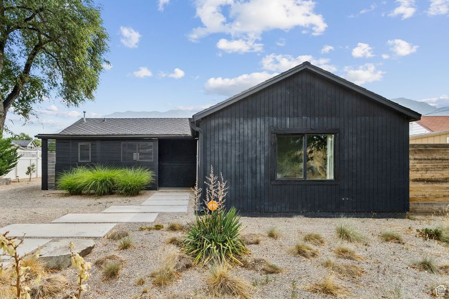 Welcome to this stunningly remodeled home with the perfect separate ADU. Whether you are an investor or looking for a secluded office or personal mother-in-law apartment, this turnkey property is for you! The Main House has a fully-updated kitchen, 3 bedrooms, one bathroom, living room and laundry. The Guesthouse is complete with a sprawling kitchen & great-room, 1 bedroom, 1 bathroom, and private laundry. This thoughtfully re-designed property includes all of the important upgrades done within the past 6 years: furnace & AC, water heaters, ductless HVAC, windows, roofs, solar panels, sprinklers, and a fully fenced private yard with a sunken fire pit. Located just minutes away from the new BYU Medical School, IHC Utah Valley Hospital, BYU, & UVU! The Main House rents for $2,050/month & the Guesthouse rents for $1,825/month.  Buyer to verify all information.