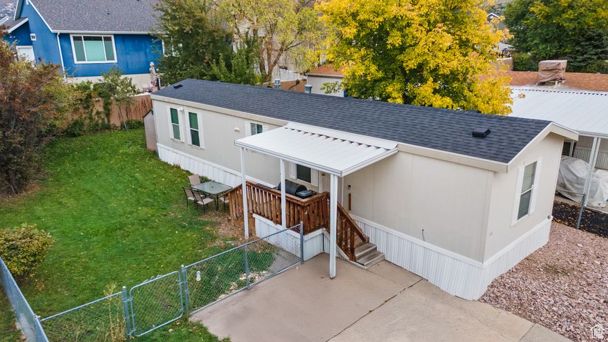 Price Reduced for Quick Sale!  Well-maintained 2006 mobile home in a gated Ogden community with pool, clubhouse, and pickleball courts. Features 2 bedrooms, 2 baths, carport parking, and access to nearby parks and schools. Move-in ready with affordable $870/mo HOA.