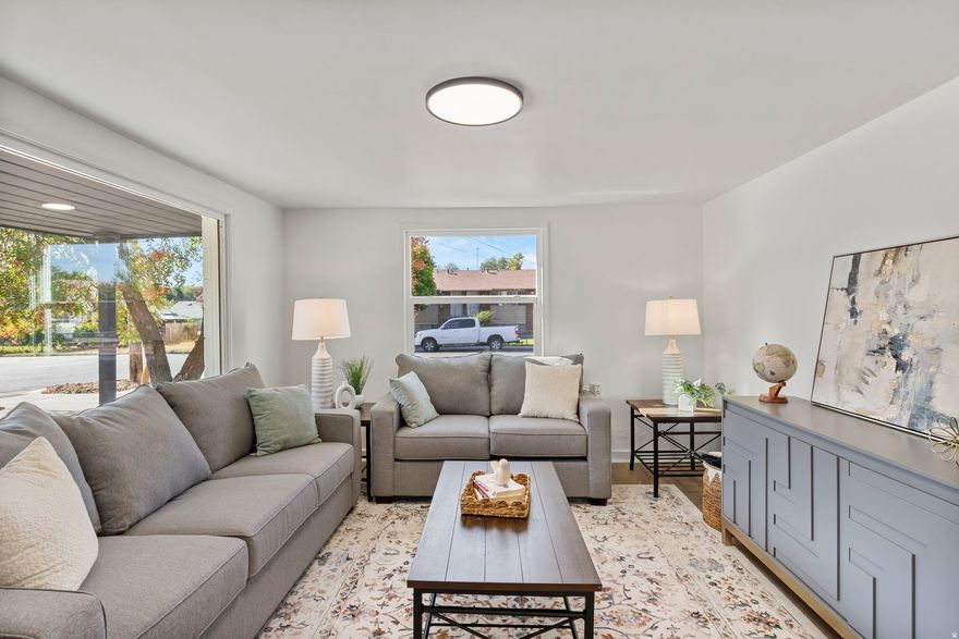 MOTIVATED SELLER!   Completely renovated and move-in ready in central Provo. This 2-bed, 1-bath single-level home has been fully updated inside and out, making it an ideal option for buyers who want zero projects. Major upgrades include a brand-new roof, new windows, new A/C, and a fully refreshed interior with new cabinets, new LVP flooring, fresh paint, and modern finishes throughout.  The open living space is bright and functional, with efficient use of all 728 sq ft. The kitchen and bathroom have been fully updated, offering a clean, modern feel that's hard to find at this price point. Situated on a corner lot, the property offers good separation from neighbors, mature trees, and off-street parking. Enjoy a covered front porch for outdoor seating and a storage shed for added utility.  Low maintenance, single-level living close to schools, shopping, BYU, and downtown Provo. Perfect for first-time buyers, downsizers, or investors looking for a turnkey rental.  Unfortunately we can not offer seller financing of any kind.  Square footage figures are provided as courtesy estimates only and were obtained from county records. Buyer is advised to obtain an independent measurement.